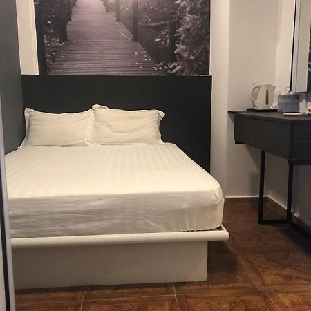 The Amazing Inn Singapore Bagian luar foto