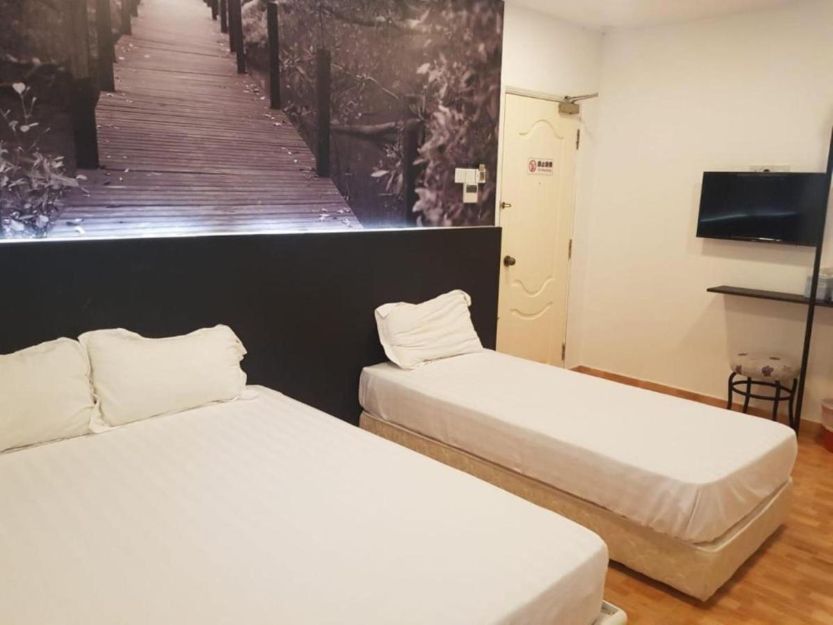 The Amazing Inn Singapore Bagian luar foto