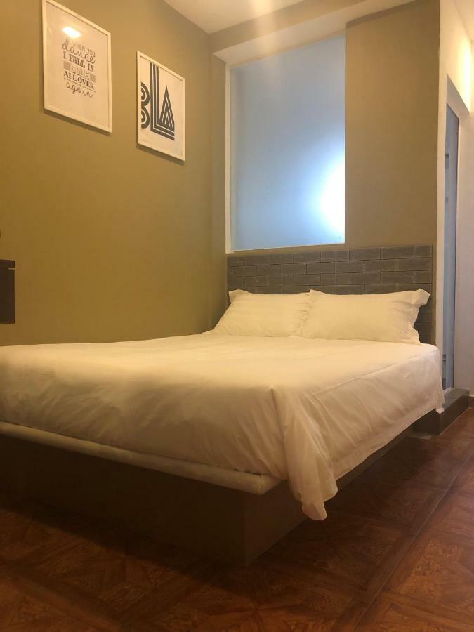 The Amazing Inn Singapore Bagian luar foto